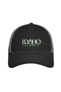 Black trucker-style baseball hat with Idaho the Movie logo in white on the front